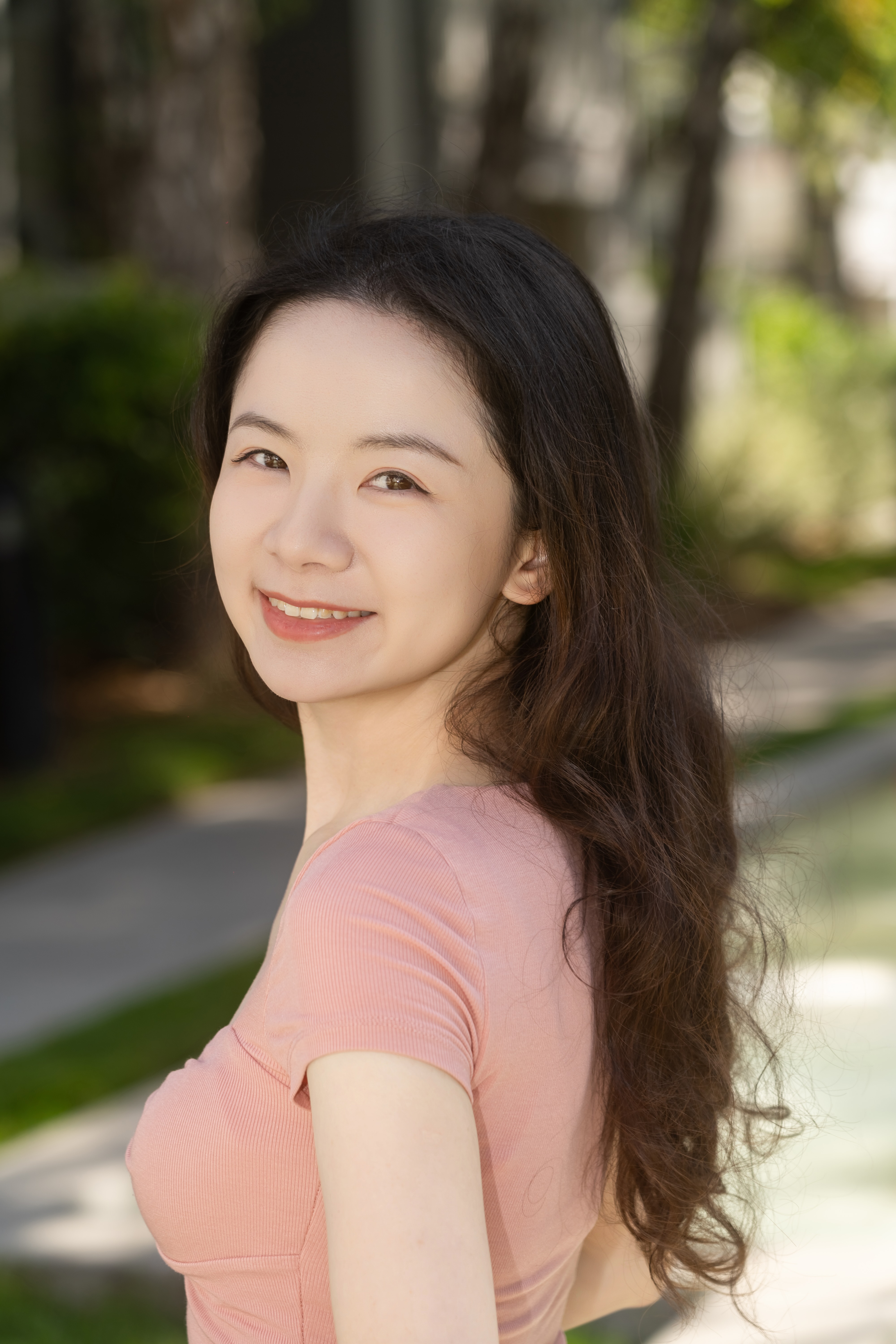 Leighton Zhang headshot with a relaxed expression