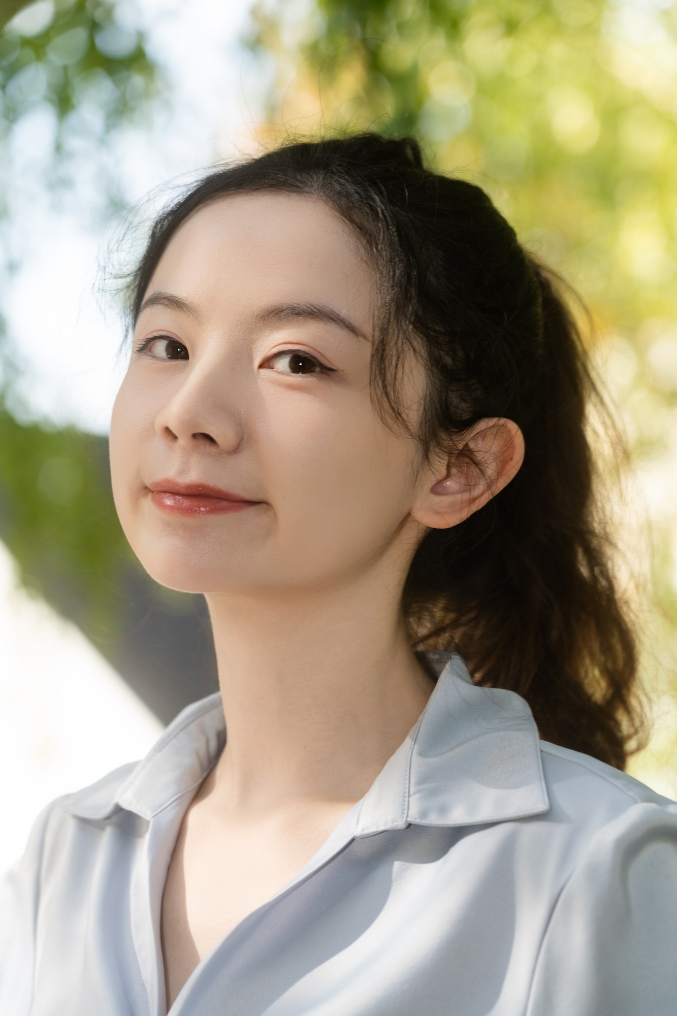 Leighton Zhang headshot in an editorial portrait